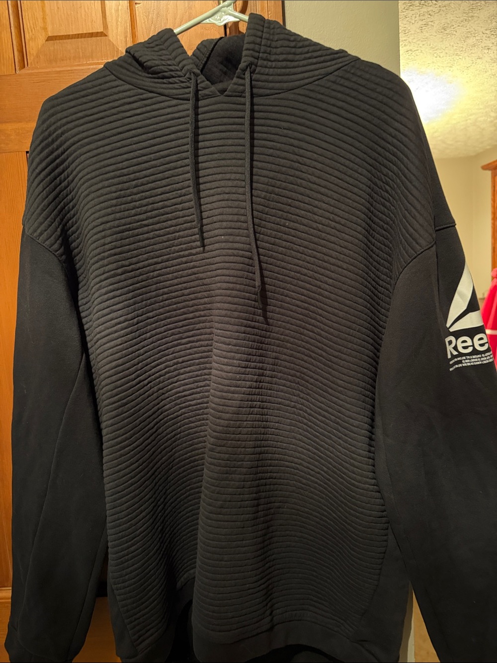 Reebok Black Quilted-Texture Pullover Hoodie with Logo Sleeve